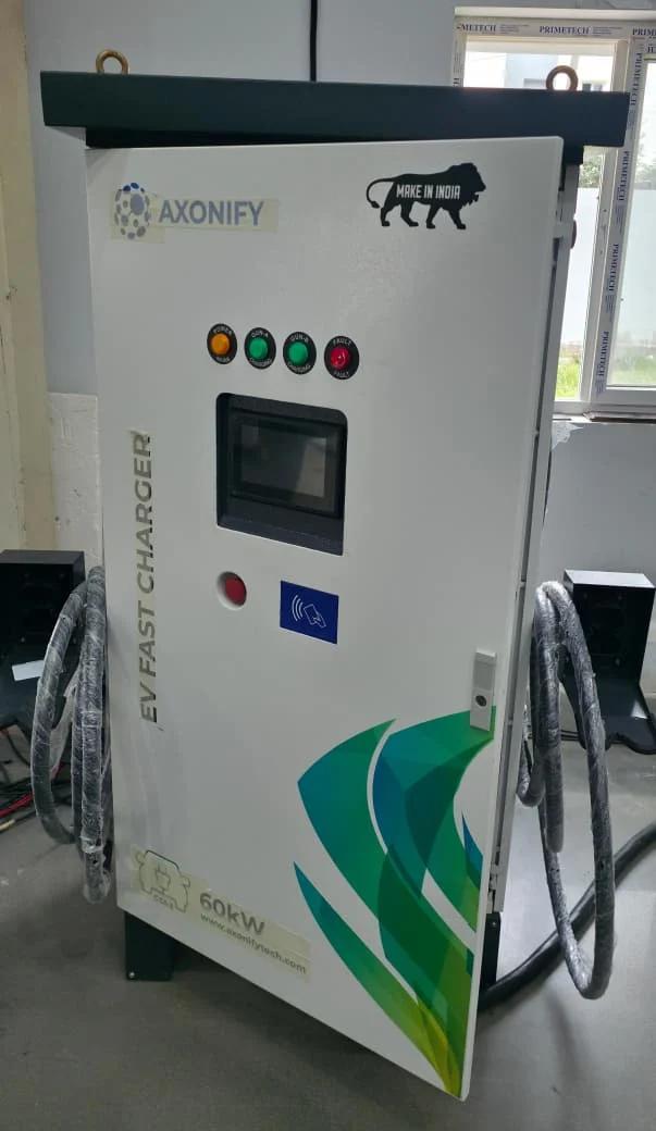 AXONIFY 60 kW DC fast charging equipment with dual charging cables.