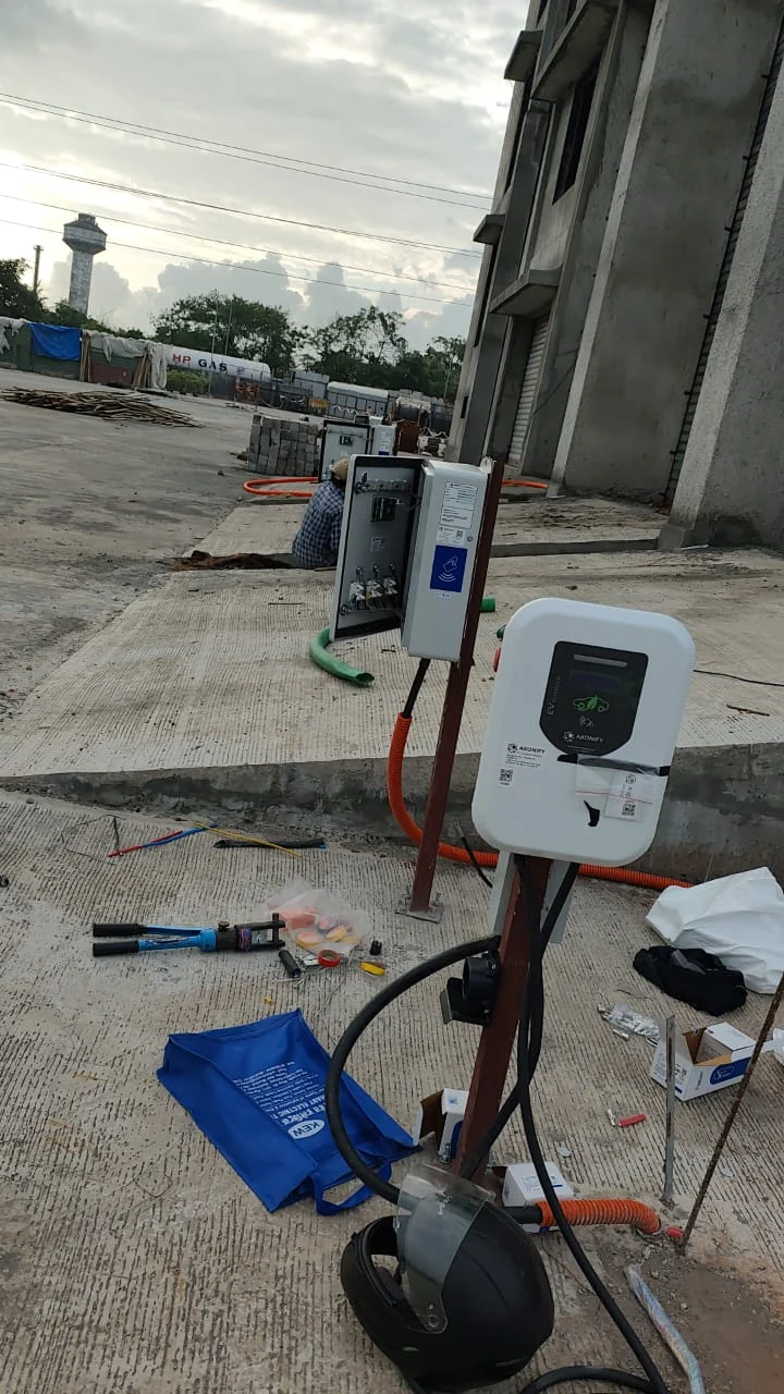 Charging equipment, supporting cabling and installation activity at site.